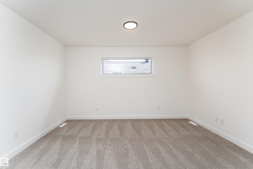 18 Tenuto Link, Spruce Grove, AB - Indoor Photo Showing Other Room
