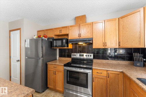 #27 290 Spruce Ridge Rd, Spruce Grove, AB - Indoor Photo Showing Kitchen