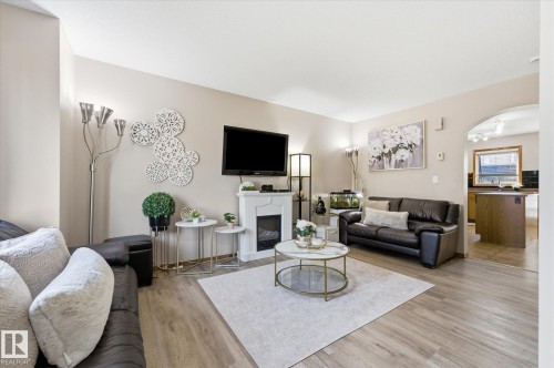 #27 290 Spruce Ridge Rd, Spruce Grove, AB - Indoor Photo Showing Living Room With Fireplace
