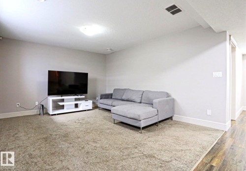 4642 Charles Way Sw, Edmonton, AB - Indoor Photo Showing Living Room