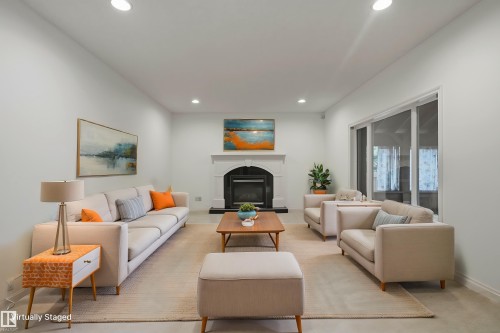 926 Hollingsworth Bend Nw, Edmonton, AB - Indoor Photo Showing Living Room With Fireplace