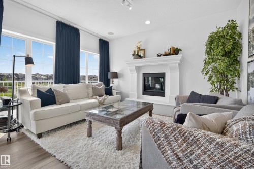 3256 Winspear Crescent Sw, Edmonton, AB - Indoor Photo Showing Living Room With Fireplace