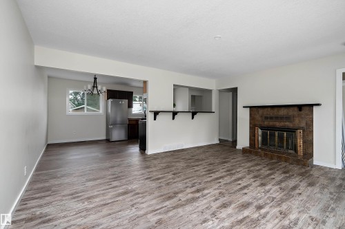4728 48 Avenue, Wetaskiwin, AB - Indoor Photo Showing Living Room With Fireplace