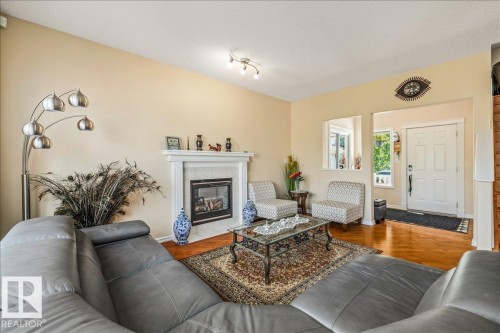 306 Hilliard Close Nw, Edmonton, AB - Indoor Photo Showing Living Room With Fireplace