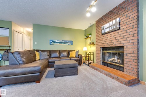 6212 179 Street Nw, Edmonton, AB - Indoor Photo Showing Living Room With Fireplace