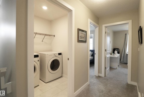 66 Springwood Way, Spruce Grove, AB - Indoor Photo Showing Laundry Room
