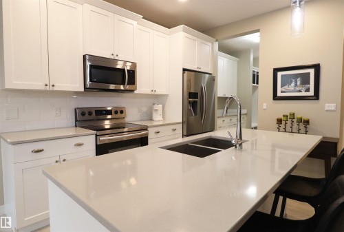 66 Springwood Way, Spruce Grove, AB - Indoor Photo Showing Kitchen With Double Sink With Upgraded Kitchen
