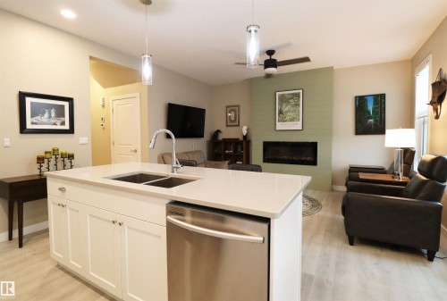 66 Springwood Way, Spruce Grove, AB - Indoor Photo Showing Other Room With Fireplace
