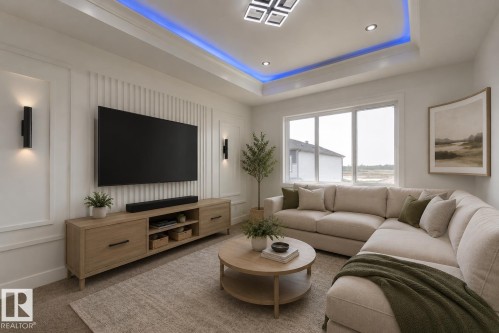 Living area featuring a tray ceiling with integrated lighting, recessed lighting, and a modern ceiling fixture - 4723 17 Avenue Sw, Edmonton, AB - Indoor Photo Showing Living Room