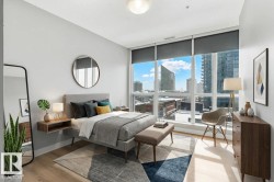 Expansive floor-to-ceiling windows with roller shades - 
