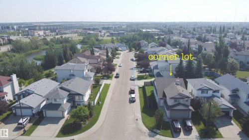 Corner lot residence featuring a two-story design with an attached garage - 3799 21 Street Nw, Edmonton, AB - Outdoor With View