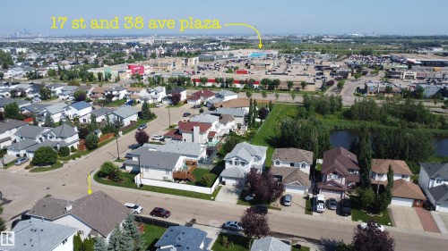 Aerial view of a residential neighborhood with varied architectural styles - 3799 21 Street Nw, Edmonton, AB - Outdoor With View