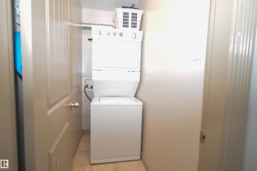 #1 10710 84 Av Nw, Edmonton, AB - Indoor Photo Showing Laundry Room