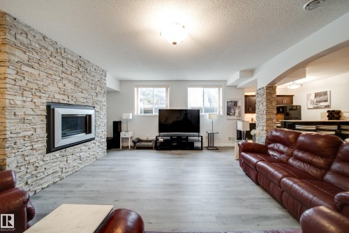 242 Running Creek Lane Nw, Edmonton, AB - Indoor Photo Showing Living Room With Fireplace