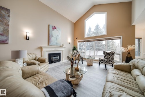 242 Running Creek Lane Nw, Edmonton, AB - Indoor Photo Showing Living Room With Fireplace
