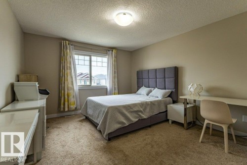 9372 Cooper Bend Sw, Edmonton, AB - Indoor Photo Showing Bedroom