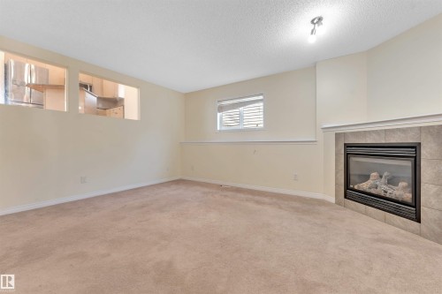 613 83 Street Sw, Edmonton, AB - Indoor With Fireplace