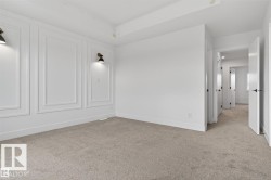 Neutral-toned carpeting paired with white walls - 