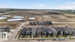 Newly constructed homes featuring contemporary architectural designs and varied exterior finishes - 