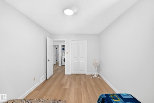 Room featuring light wood-finish flooring and white walls - 6208 11 Ave Nw Nw, Edmonton, AB - Indoor