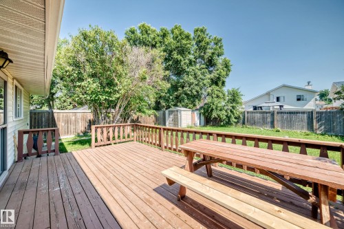 Spacious wood deck with perimeter railing - 6208 11 Ave Nw Nw, Edmonton, AB - Outdoor With Deck Patio Veranda With Exterior
