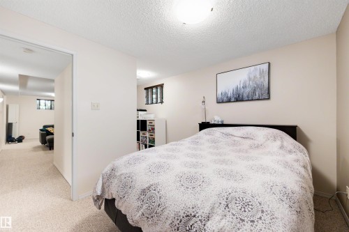 Carpeted flooring throughout, neutral wall tones, and recessed lighting - 10732 129 Street Nw, Edmonton, AB - Indoor Photo Showing Bedroom