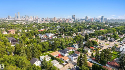 Expansive aerial perspective showcasing a residential neighborhood with a distant cityscape - 10732 129 Street Nw, Edmonton, AB - Outdoor With View