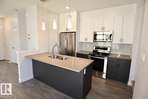 10820 86 Avenue Northwest, Edmonton, AB - Indoor Photo Showing Kitchen With Stainless Steel Kitchen With Double Sink With Upgraded Kitchen