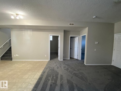 122 142 Selkirk Place, Leduc, AB - Indoor Photo Showing Other Room