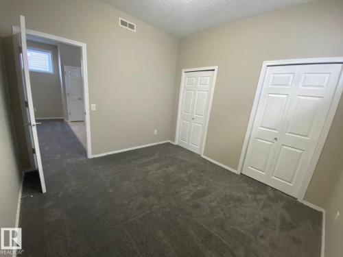 122 142 Selkirk Place, Leduc, AB - Indoor Photo Showing Other Room