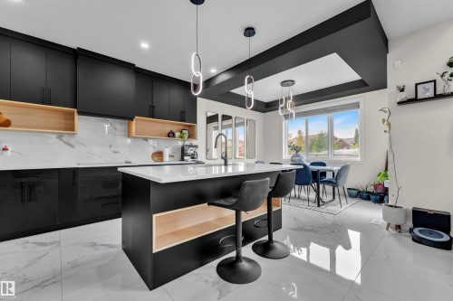 3924 41 Avenue, Beaumont, AB - Indoor Photo Showing Kitchen With Upgraded Kitchen