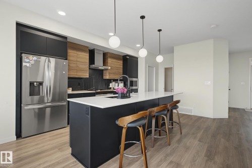 3313 Kulay Way Sw, Edmonton, AB - Indoor Photo Showing Kitchen With Stainless Steel Kitchen With Upgraded Kitchen