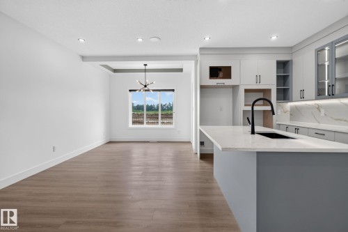 452 Robinson Blvd, Leduc, AB - Indoor Photo Showing Kitchen With Upgraded Kitchen