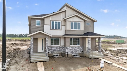 452 Robinson Blvd, Leduc, AB - Outdoor With Facade