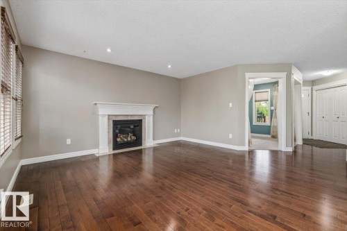 1416 56 Street Sw, Edmonton, AB - Indoor Photo Showing Living Room With Fireplace