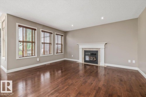 1416 56 Street Sw, Edmonton, AB - Indoor Photo Showing Living Room With Fireplace