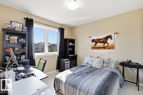 28 Sutherland Street, Leduc, AB - Indoor Photo Showing Bedroom