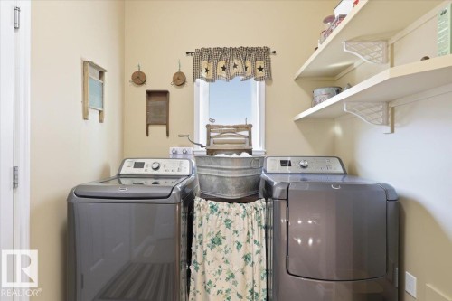 28 Sutherland Street, Leduc, AB - Indoor Photo Showing Laundry Room