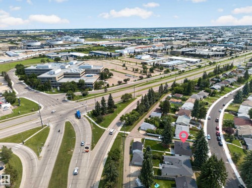Aerial perspective showcasing residential properties and commercial zones - 5204 97A Avenue Nw, Edmonton, AB - Outdoor With View