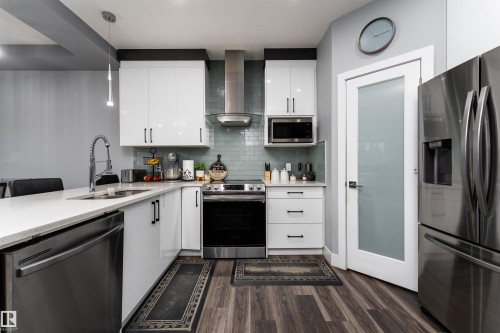 1613 Enright Way Nw, Edmonton, AB - Indoor Photo Showing Kitchen With Stainless Steel Kitchen