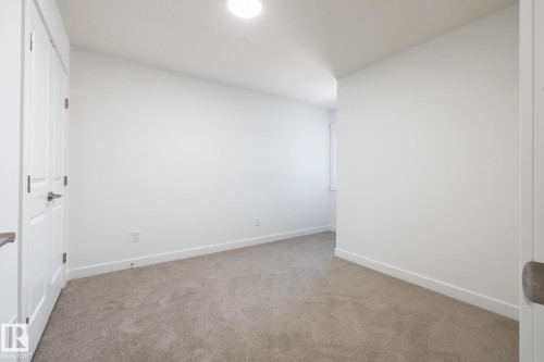 #21 7020 Keswick Cm Sw, Edmonton, AB - Indoor Photo Showing Other Room