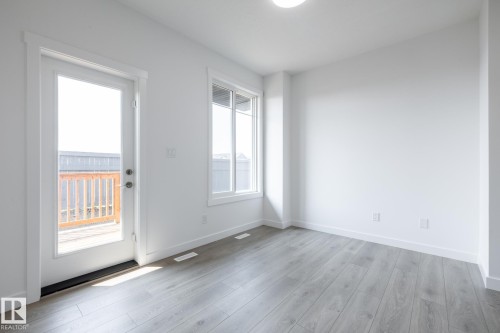 #21 7020 Keswick Cm Sw, Edmonton, AB - Indoor Photo Showing Other Room