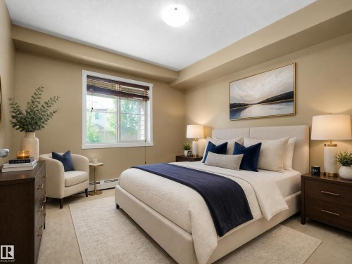 Bedroom featuring a window with blinds, recessed lighting, and carpet flooring - #109 3207 James Mowatt Tr Sw, Edmonton, AB - Indoor Photo Showing Bedroom