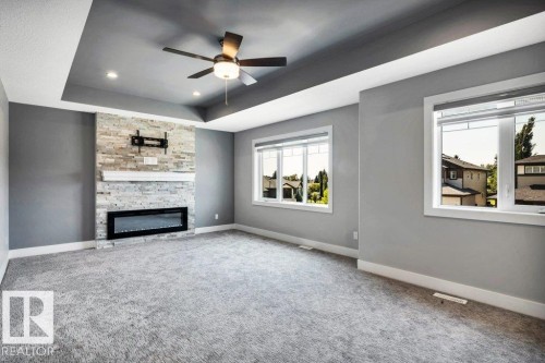 4403 Triomphe Gate, Beaumont, AB - Indoor With Fireplace