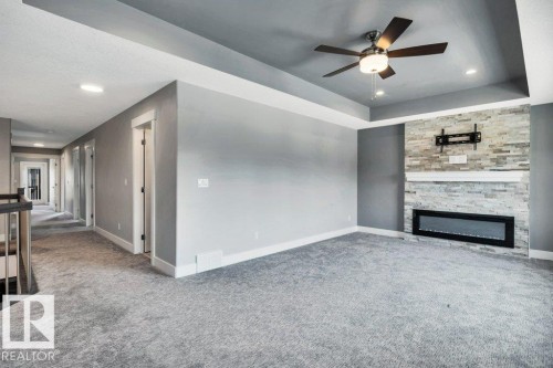 4403 Triomphe Gate, Beaumont, AB - Indoor With Fireplace