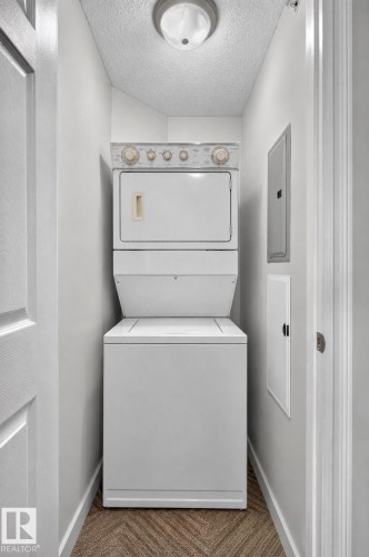 #411 4407 23 St Nw, Edmonton, AB - Indoor Photo Showing Laundry Room