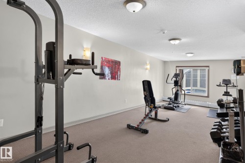 #411 4407 23 St Nw, Edmonton, AB - Indoor Photo Showing Gym Room