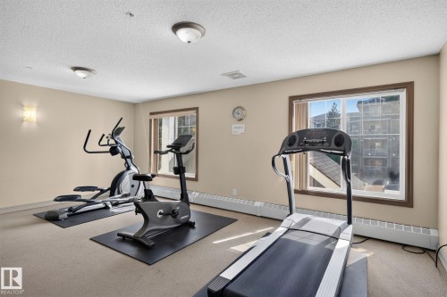 #411 4407 23 St Nw, Edmonton, AB - Indoor Photo Showing Gym Room
