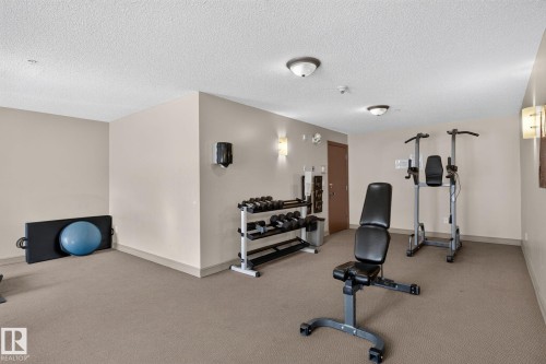 #411 4407 23 St Nw, Edmonton, AB - Indoor Photo Showing Gym Room