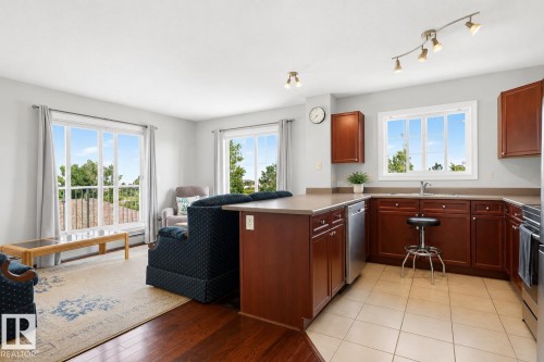 #411 4407 23 St Nw, Edmonton, AB - Indoor Photo Showing Kitchen With Double Sink